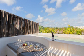 Luxury 2BR Apartment Aldea Zama with Private rooftop plunge pool 24 7 security in a Gated Community